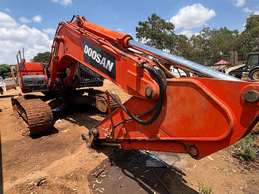 Doosan DX225LCA crawler excavator on site